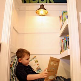 childs converted cupboard reading nook